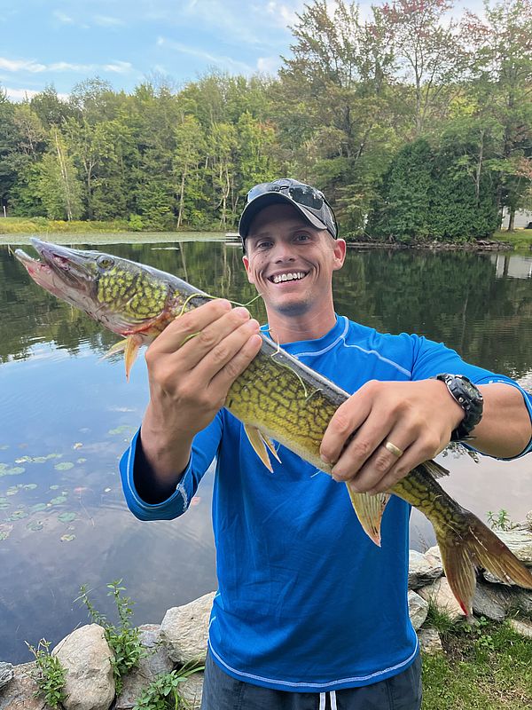 Mike Sommers holding large pickerel