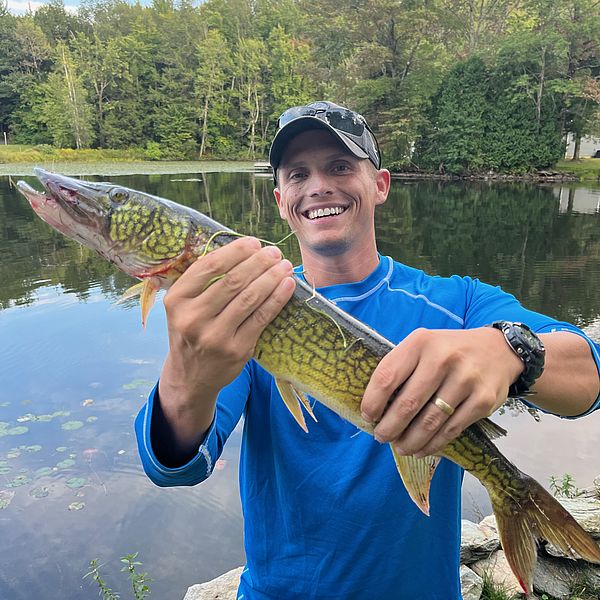 Mike Sommers holding large pickerel